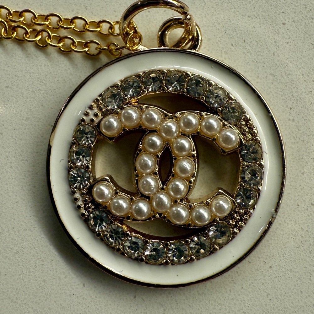 CHANEL Gold and Pearl Accent Necklace